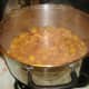 Peaches are cooked a with a little water and sugar to taste. A dash of nutmeg can be added to enhance flavor.