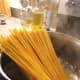 Cook the pasta in the boiling water, stirring occasionally until cooked. 