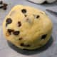 Combine the raisins into the dough. Knead until the raisins are combined with the dough.
