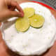 Decorate the cake. I decided to decorate it simply with a few thin slices of key lime. 