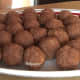 Cake balls formed from the mixture of crumbled cake with nougat cream.