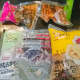 Inside the package: snail soup base, peanuts, pickled long beans, bamboo shoots, vinegar, chili oil, dried bean curd skin