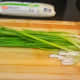 Slice the spring onions and the tofu.
