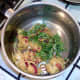 Chopped coriander is added to mash