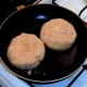 Fishcakes are put on to fry