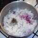 Red onion and mint are added to mash