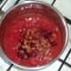 Beans are added to tomato sauce