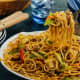 Pancit canton: Sauteed in soy sauce and ginger with squid, shrimp, and vegetables. It can also be cooked with sliced pork and quail eggs.