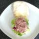 Corned beef mash is spooned on to salad bed