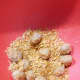Roll the balls in the crushed cornflakes to garnish. 
