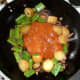 Jalfrezi sauce is added to stir fried vegetables