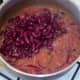 Red kidney beans added to curry sauce