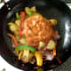 Rogan josh sauce is added to stir fried vegetables