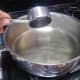 Once the pan is hot, add the oil and reduce the heat.