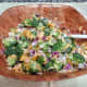 Gently pour the the dressing over the salad and combine it into the salad.