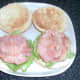Bacon is laid on chickpeas and lettuce