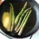 Asparagus is briefly sauteed in butter and oil