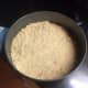 Crumble the graham crackers into the bottom of a springform pan, and bake it in the oven for 15 minutes at 350&deg;F. 