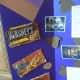 Save your wrappers from the chocolate chips to decorate the board. Sophie also made chocolate chips out of paper and we printed off photos of the project.