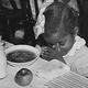 Girl Praying for School Lunch during Depression, 1936