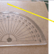 Marking 15 degree points, eight on each side of the noon line. The noon line is perpendicular to the plane and the centre point.