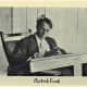 This photo of Robert Frost was taken when he was a young man.