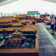 People looking at the scale models of the buildings in the Forbidden City in China