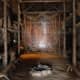 Inside a 15th century Iroquois Longhouse in Ontario, Canada. Notice the wooden benches used.