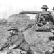 British Vickers machine gun in action on the Western Front. The machine gun revolutionized the way war would be fought in the twentieth century.