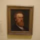 Here is what William Henry Rinehart looked like... or at least something close to that. “Portrait of William Henry Rinehart” (1865) by Francis (Frank) Blackwell Mayer (American) 1827-1899. Made with oil on canvas.
