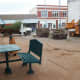 Ripping out planters and other fixtures inside the Poteau Pocket Park (Town Square)