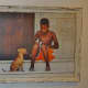 Boy and Dog in Cuba Behind Open Doors by Kevin Douglas West