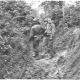 Crew laying wire near St. Lo, June 1944. The steep hedgerows helped conceal the crews but also the enemy. Many times the Germans were able to ambush the crews and cut the wire.