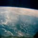 Photo of earth taken from orbit by Gordon Cooper aboard Faith 7. Photo courtesy of NASA.