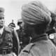 Famed German General Erwin Rommel inspecting Indian troops under his command. Note the traditional Pagri turban headdress, worn by the soldiers.