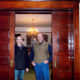 John and Rob stand between a pair of the many sliding wood doors stained and kept in immaculate operation and appearance.