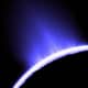 Backlit ice geysers spew from Enceladus' southern limb, shooting plumes of frozen water hundreds of kilometers into space.