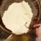 Slowly stir flour mixture into sugar mixture.
