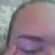 Place your finger at the corner of your eye and pull outwards, making the skin taut. Another variation of this is to pull the skin outwards and upwards. Either way will work great!