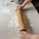 Using gentle pressure begin rolling out the dough.