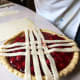 Now you see how this is going. I work from the center out, adding strips on each side until the pie is fully latticed.