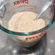 In a pitcher, combine the warm milk, yeast, and sugar. Let the mixture dissolve and set aside for 5 minutes.