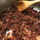 Continue cooking and stirring occasionally for up to 3 hours. You're looking for the bacon jam to turn a nice dark, chocolate brown color. Be careful as the last of the liquid evaporates. You don't want to burn it at the end, and it can happen fast!
