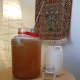 Add honey to water, mix well. Leave a decent amount of headroom; otherwise, your mixture will overflow.