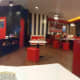 Very bright red interior with large booth tables good for groups of 4 and up!