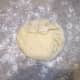 Step Eleven: When mixed, turn your dough out onto a clean floured surface.