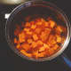In a large pan, boil the potatoes until soft. 