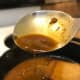 The finished pan sauce is slightly thickened, bursting with flavor and ready to serve.