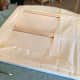 Step 6- Fold your corners just a you would if you were wrapping a birthday present.