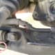 G.  Remove power steering hose clamp and hose.